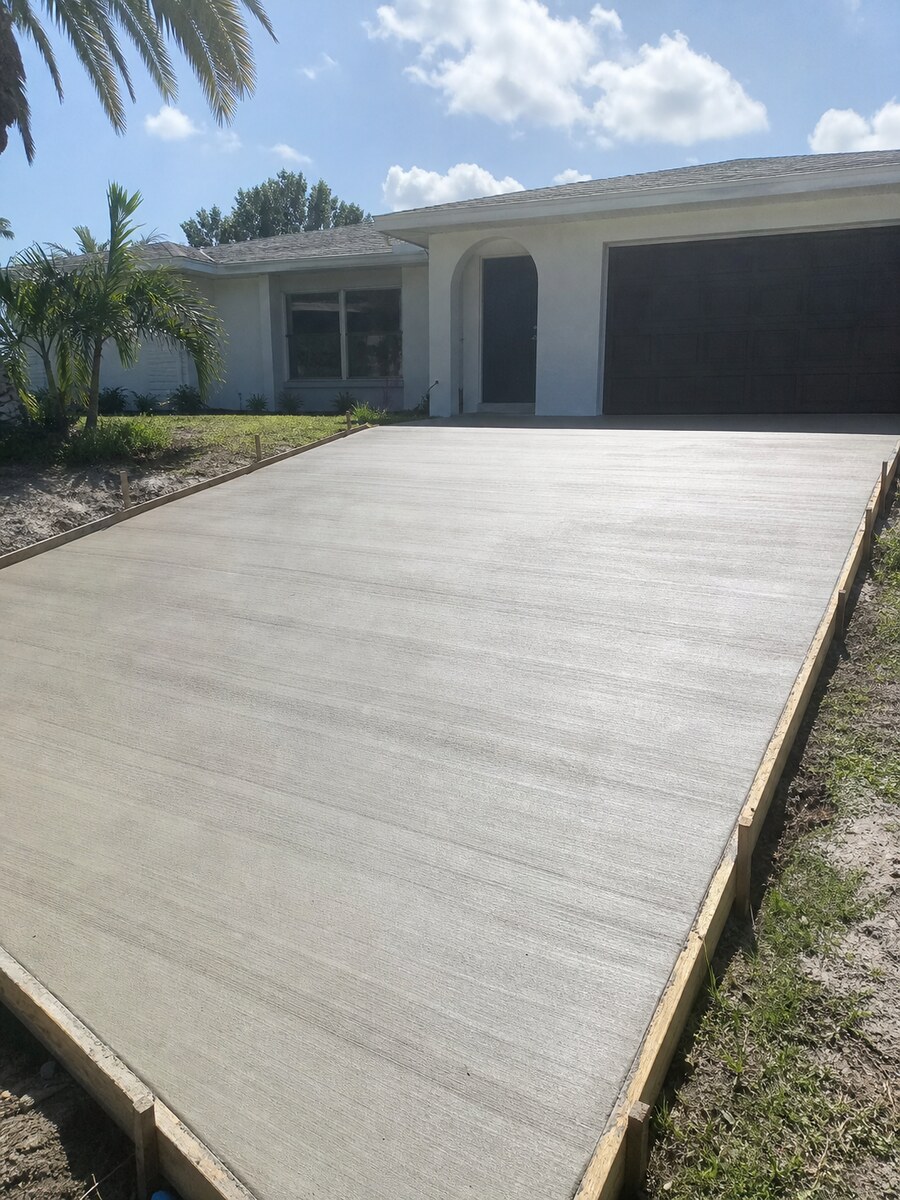 Concrete driveway pour preparation at a Jensen Beach home